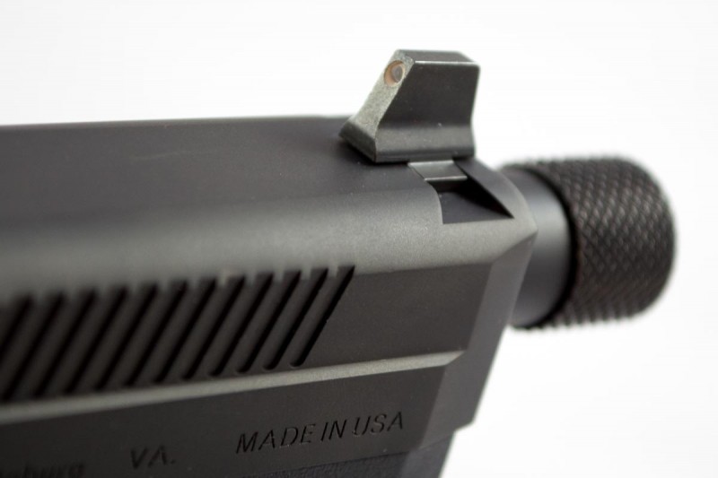 The FNX 45 Tactical comes with tall night sights for suppressor use and a threaded barrel.