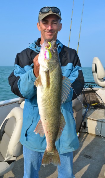 Keith Eshbaugh poses with a six-pound walleye that hit the worm behind the newly named Mullemon Berry blade.