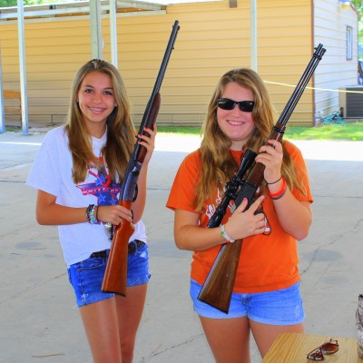 Anxious with Anticipation!! Jade (L) has never shot before, and it has been a long time since Maddie (R) has pulled a trigger. They are getting some hands on time with a few rifles before we headed for the range to shoot for Take Your Daugher to the range day!!