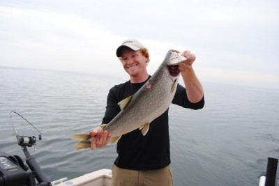 Hunter Engel shows off a Lake Michigan lake trout.