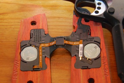 The resin-impregnated rosewood panels are perfectly carved to accommodate the electronics.