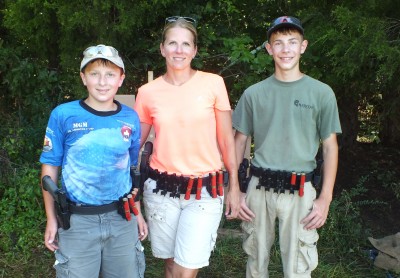 A shooting family: Becky Yackley, with Tim right) and Sean (left), at stage one at the AR15.com Rockcastle 3 Gun.