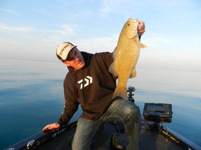 During the summertime, Michigan smallmouths often hold on to the deepest structure available.