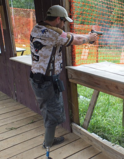 Chris Fleming shoots stage four with his pistol. 