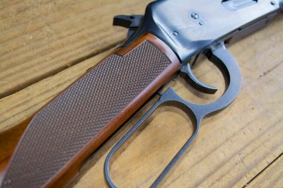The Winchester 9410 has modern safety features: a top tang safety lever and trigger stop button. You have to fully close the lever in order to fire the gun.