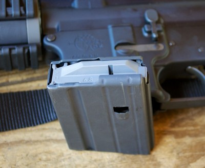 Pick up a 5 round magazine or two and this makes a fine hunting rifle. The lower profile magazine helps when lugging this around and allows more flexible shooting positions.