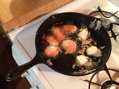 Chunks of a muskie fry in a cast-iron pan after the fish didn’t survive its release.
