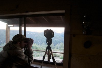Guide Mike White glasses for elk in the dawn of a cool day on the first morning of the hunt.