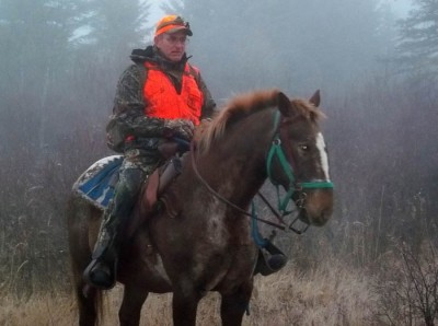 The author rides out to hunt deer in Manitoba’s Duck Mountain Provincial Forest.