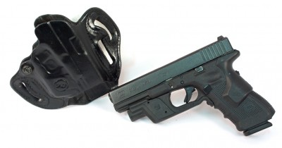 Here's a Glock 31 with Crimson Trace Lightguard and Lasergrips. The Lightguard-ready holster is a DeSantis Speed Scabbard.