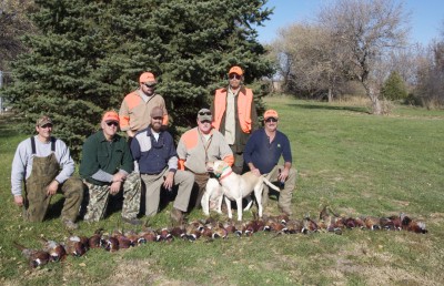 Part of the hunting party with their harvests.