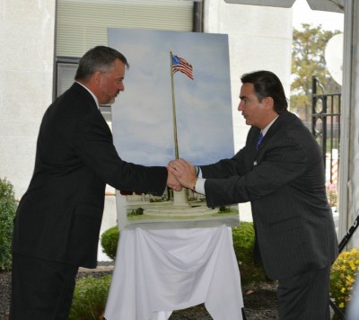James Debney, President and CEO of Smith & Wesson with Springfield Mayor Sarno.
