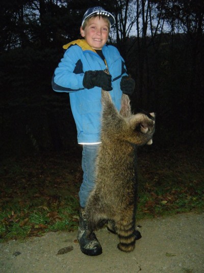 Jake, age nine, and Tommy Skarlis of Waukon, Iowa set a long line for raccoons and possums this fall and harvested 33 raccoons and 14 possums. Image courtesy Tommy Skarlis.