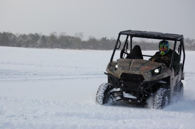 It'd take a lot of snow to stop most side-by-sides, like this Kawasaki Teryx. Image by Brandie Sigler.