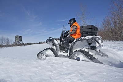 Late-season hunting means getting back into the snow-covered woods for hunters in Northern climates. ATVs set up right can be a big help. Image courtesy Polaris.