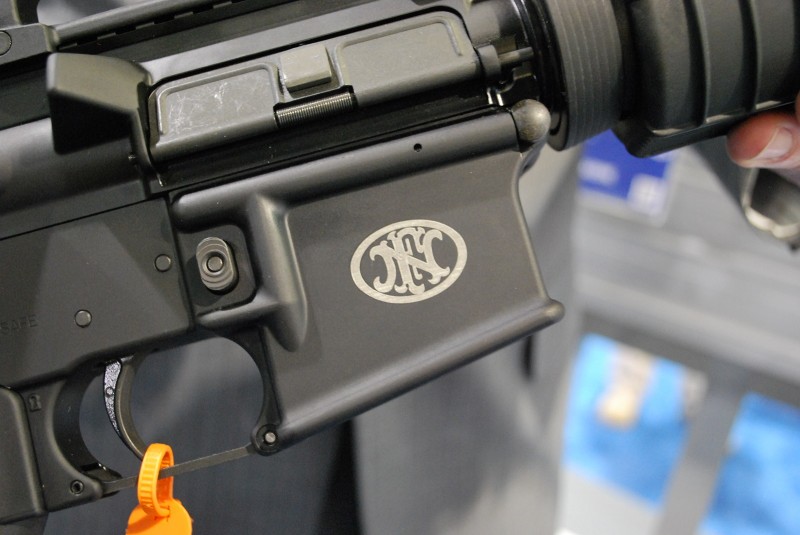 The FNH USA rollmark on the FN 15 lowers.