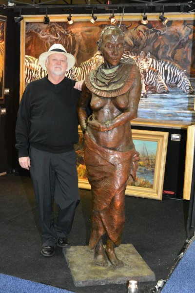 Terry Lee with his Masai woman sculpture.