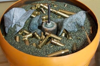 Cleaning a load of rifle brass using a dry tumbler. Note how the used dryer sheets help pull the dirt out.