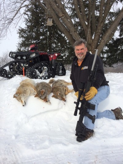ScentBlocker's Scott Shultz with three coyotes.