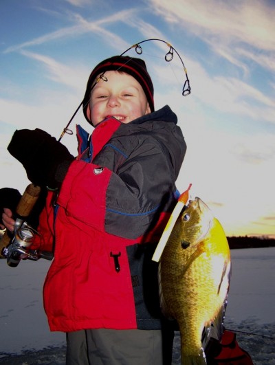 Kids taught how to fish with patience and understanding can become enthusiastic lifetime fishing partners. Image courtesy Loren Keizer.