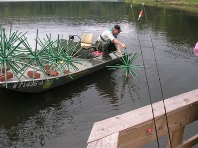 The Kentucky Department of Fish & Wildlife sinks Porcupine Fish Attractors to attract crappies and other gamefish within casting range of a public fishing dock.
