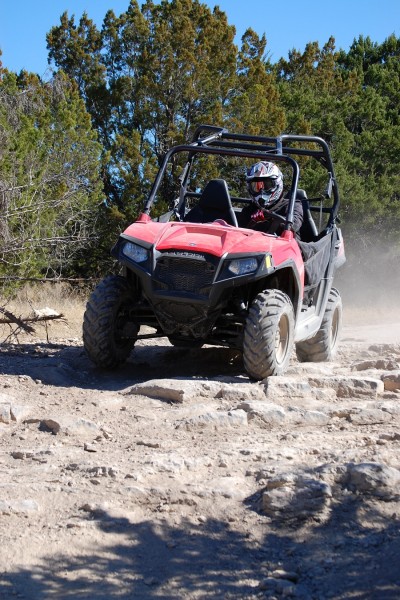 The RZR 570 can handle just about any terrain you’d find on the trail.