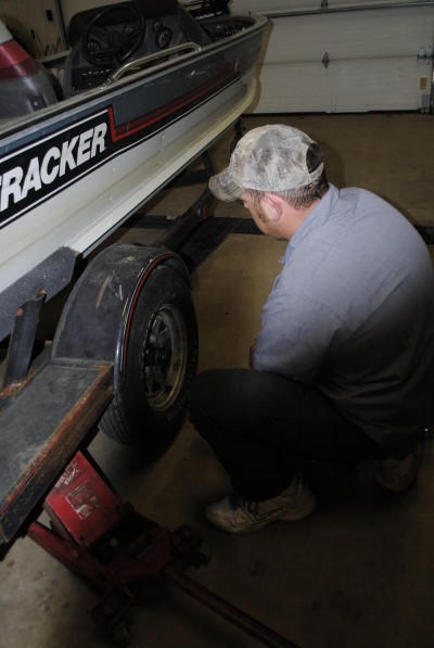 Jack up the trailer and spin the wheels to check the wheel bearings.