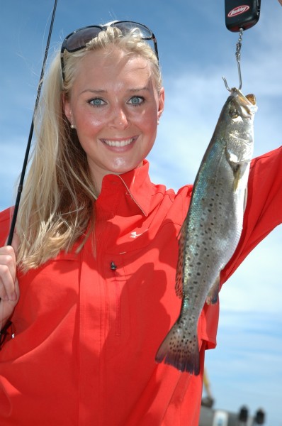 Roseanne Patton with a school-size speckled trout caught under the birds out of Bay St. Louis, Mississippi.