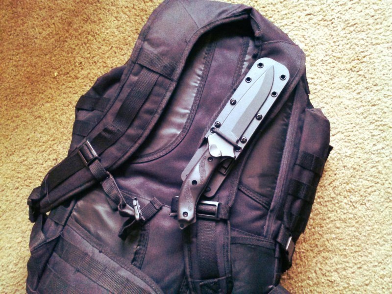 I attached this Nighthawk utility knife across one of the shoulder straps. Despite this carry position being trivialized by Hollywood, I find that its handy place to put a knife and takes weight off your legs.