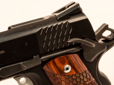 The scale pattern is used on the front and rear cocking serrations.