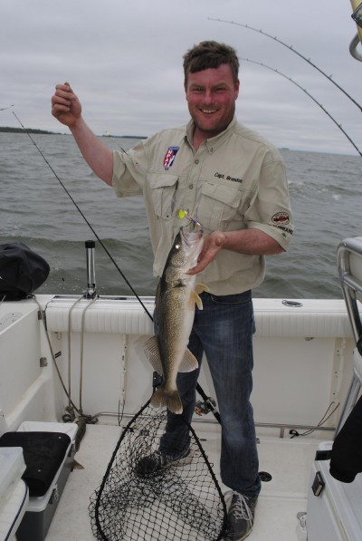 Brandon Stanton shows off a nice Sagniaw Bay walleye.