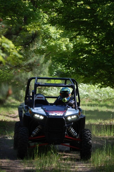 The RZR XP 4 1000 is a long, wide machine that is too big for some trails, but just right for others. Image by Brandie Sigler.