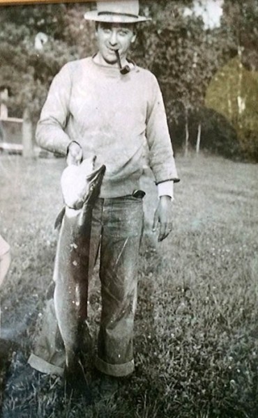 The late Paul Olson with a muskie he caught in 1942.