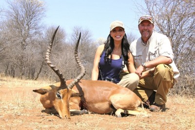 Julie McQueen and Daniel Lee with an impala.