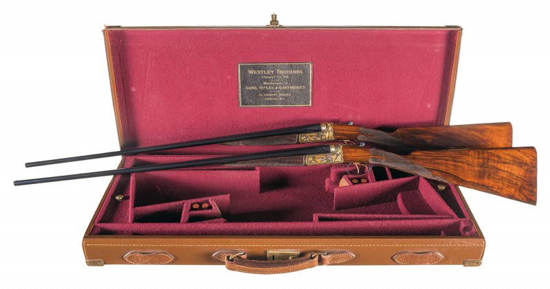 Where will you put this pair of lavishly-adorned shotguns? 