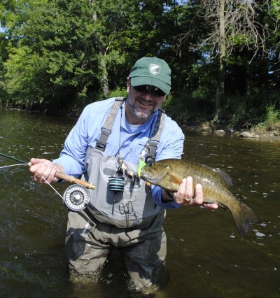 Dirk Fischbach shows off a Flint River smallmouth.