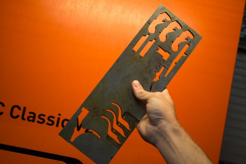This single, partially used steel plate shows how the EDM machines cut parts from the sheet of steel.
