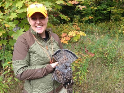 The author with a ruffed grouse from Michigan's Upper Peninsula. Image by Dwaine Starr.