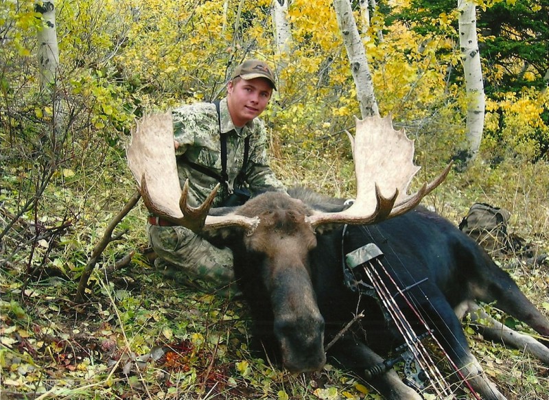 Jesse Shupe with the author's trophy Shiras moose. Image courtesy Dennis Dunn.
