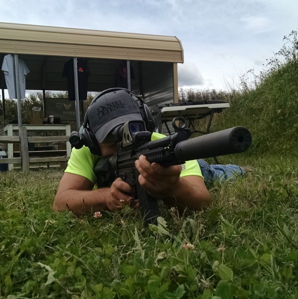 Matt Ohrstrom aims the D300P from a prone position.