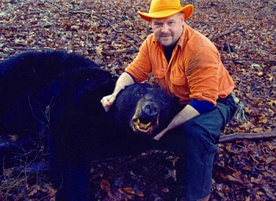 The melon-headed bear in this picture is the largest black bear taken by a hunter. Robert Christian shot it in Monroe County, Pennsylvania in 2011.
