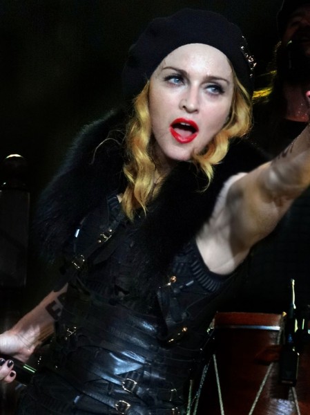Madonna performing live during the MDNA tour. Image from user IndianBio on the Wikimedia Commons.