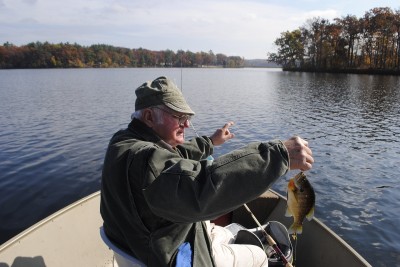 Fred Smith hauls in a nice autumn bluegill.