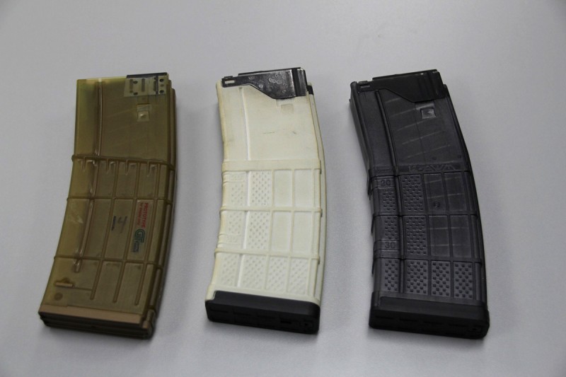 The L5AWM AR-15 magazine, seen here in its final form on the right with developmental models on the left, is one of Lancer's signature products.