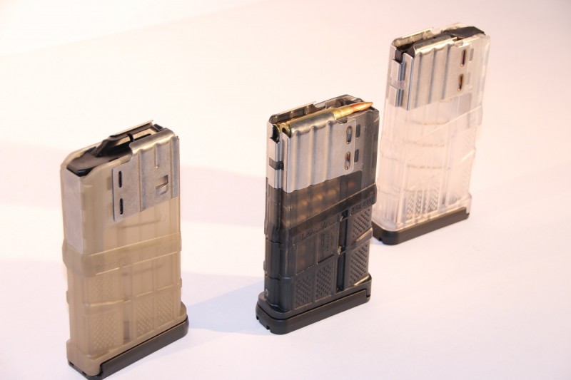 Three new Lancer L7AWM magazines. The L7s are built around a stainless steel "core" with a polymer body.