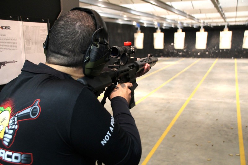 The author shooting a Lancer L30 rifle with the SRSM.