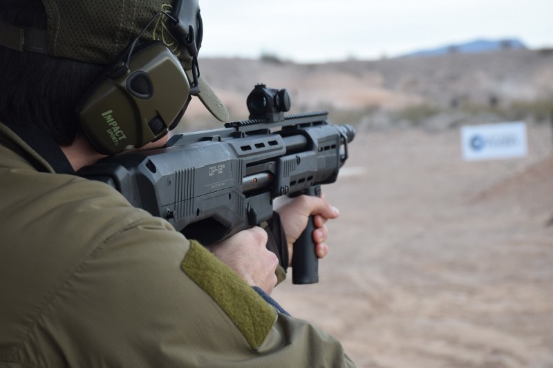 The DP-12 uses a unique trigger mechanism that fires both barrels one at a time. The first pull lets out a shell from the right, the second from the left.