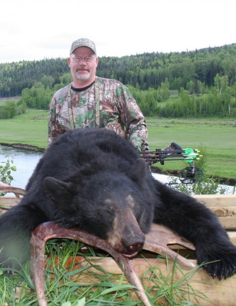 The author has bagged many black bears, such as this one taken in British Columbia in 2013, on the last day of his hunt. He held out for a color phase bear right up until the last minute. Image courtesy Bernie Barringer.