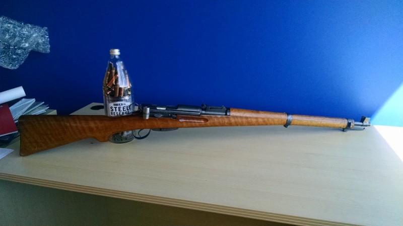 The author's 1934-dated Swiss K31. Typically, custom Steel Reserve paperweights are not included with rifle purchases. Image by Matt Korovesis.