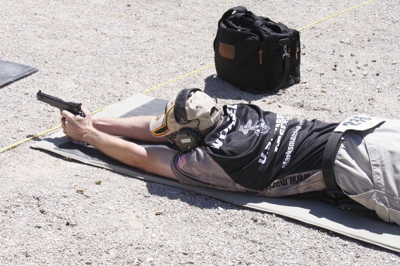 Kevin Worrell shoots his handgun from a prone position—one of the many techniques shooters must master to have a chance at the top spot.
